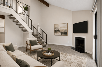 A living room with a fireplace at hilltop view in denver, co